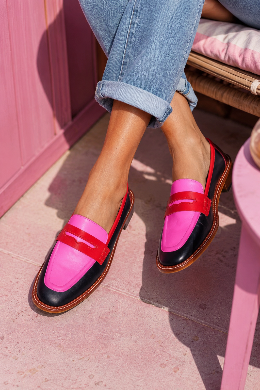 Comfortable pink women's penny loafers with low heel. Classic slip-on round toe design, ideal for smart casual & work.