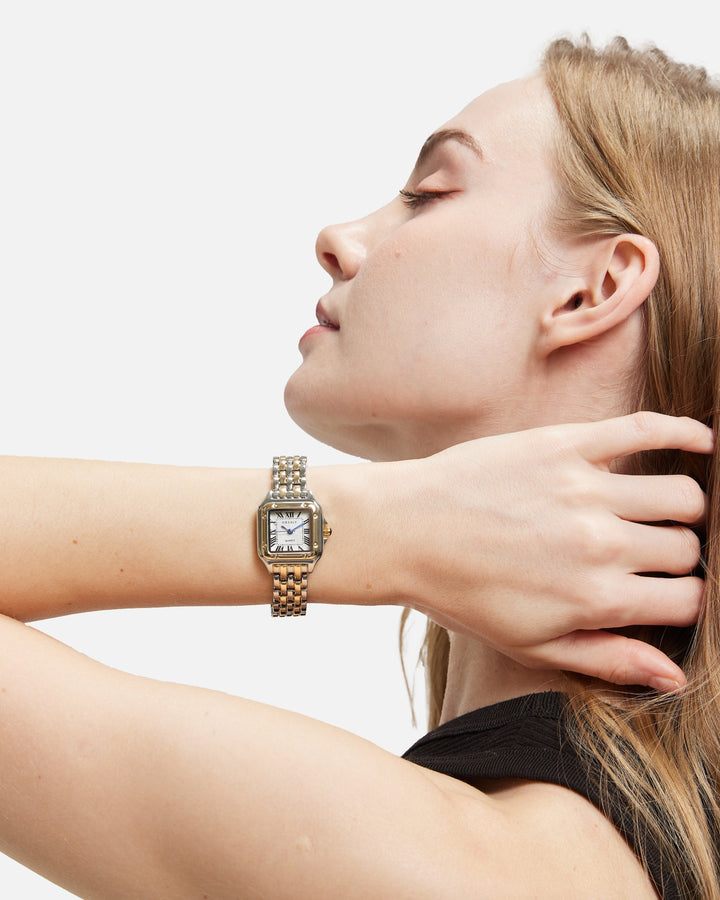 Women's Vintage-Inspired Quartz Watch on wrist, showcasing adjustable band and timeless elegance for female accessories.
