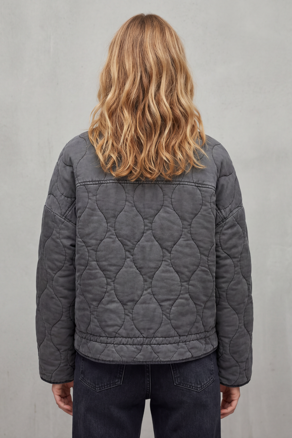 Classic women's puffer jacket, quilted design, flattering fit; versatile winter coat for warmth and style.