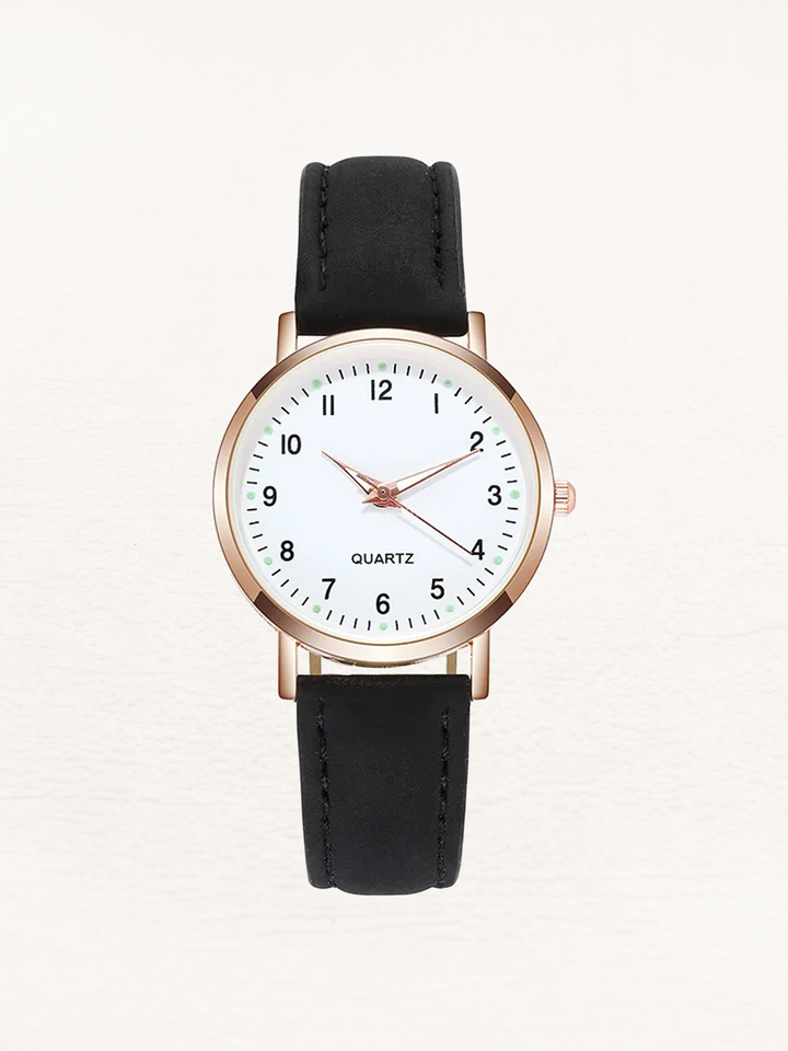 Women's classic round dial watch with a brown leather strap, perfect for everyday elegant style.