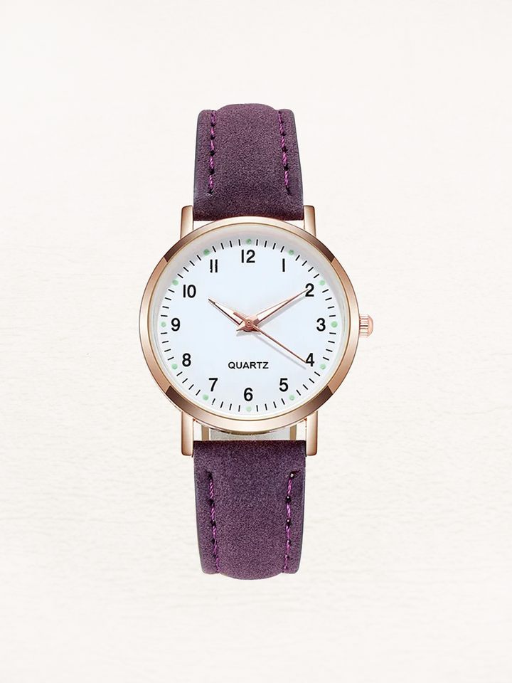 Women's classic round dial leather strap watch, an elegant and minimalist accessory for everyday stylish wear.