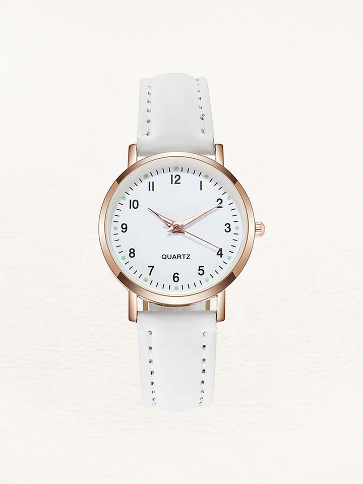 Elegant women's watch, classic round dial, and soft leather strap, a timeless accessory for any outfit.