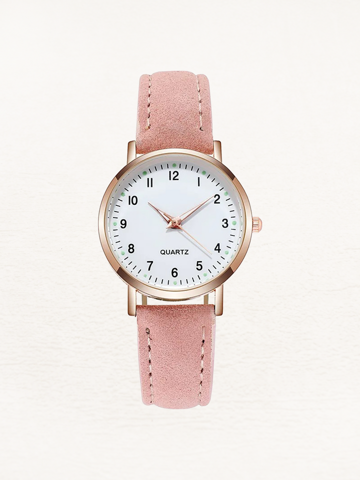 Brown leather strap women's watch with a classic round dial, a chic and durable everyday accessory.