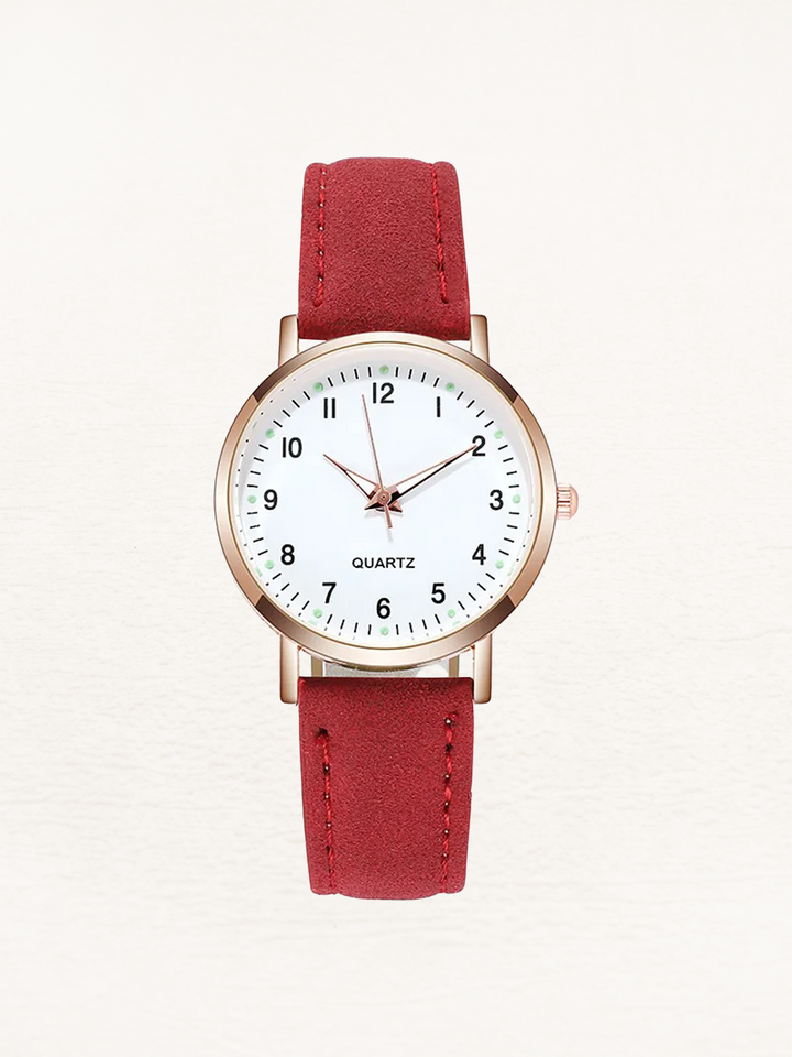 Versatile women's everyday watch with a classic round dial and comfortable leather strap. Stylish accessory.