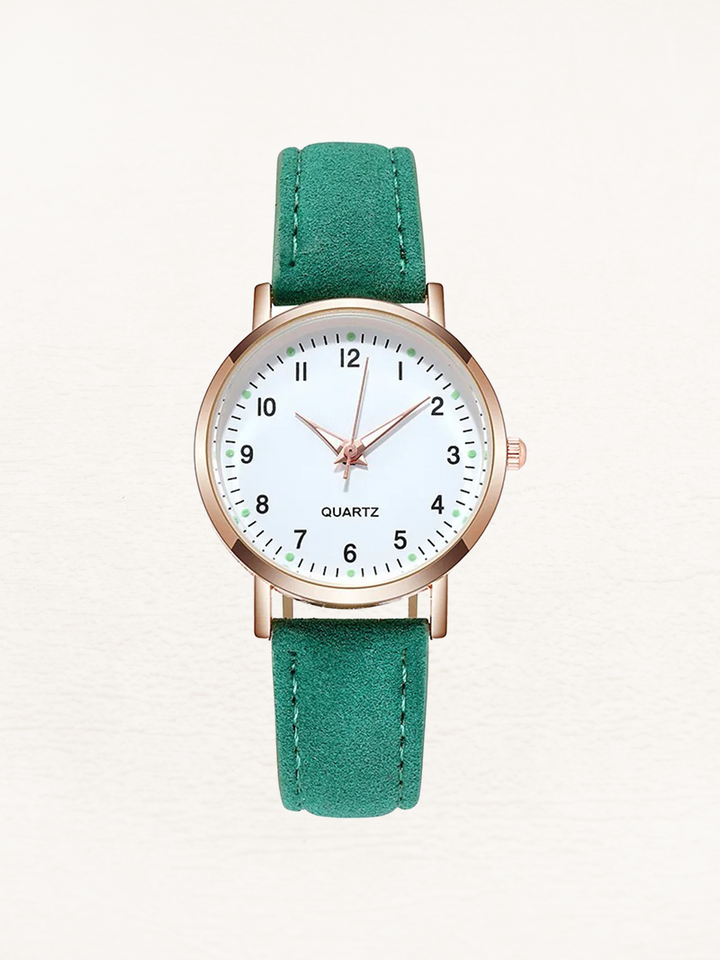 Elegant women's timepiece with a classic round dial and a sleek, comfortable leather strap for daily fashion.