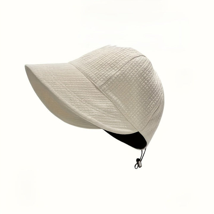 Women's classic sun hat with UPF protection. Adjustable wide brim for summer, beach, or travel.