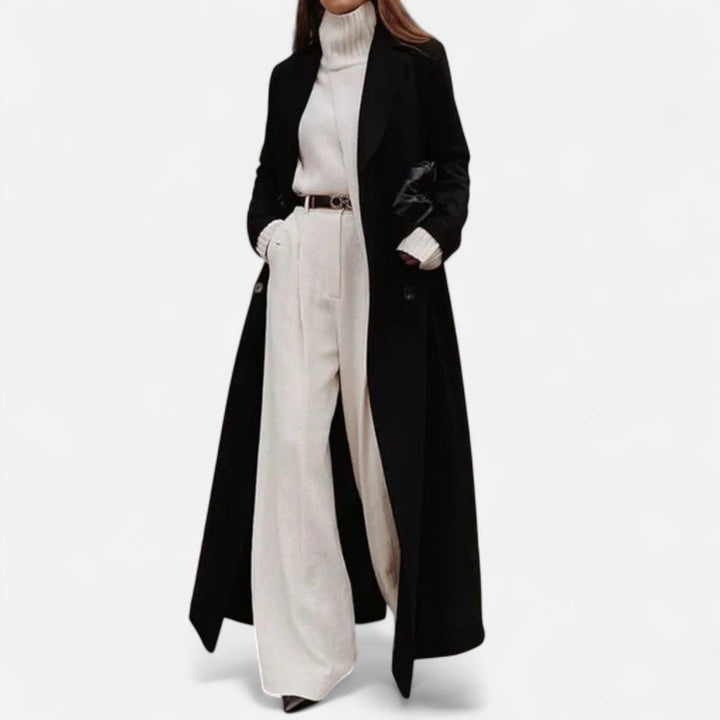 Elegant women's black longline maxi coat with a sophisticated notch lapel and button front, ideal for layered looks.