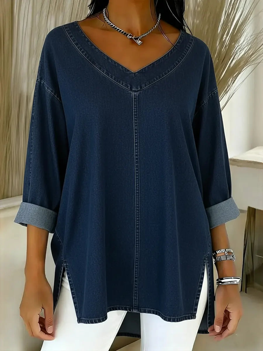 Chic women's V-neck tunic shirt with a relaxed long sleeve design, perfect for versatile layering and casual fashion.
