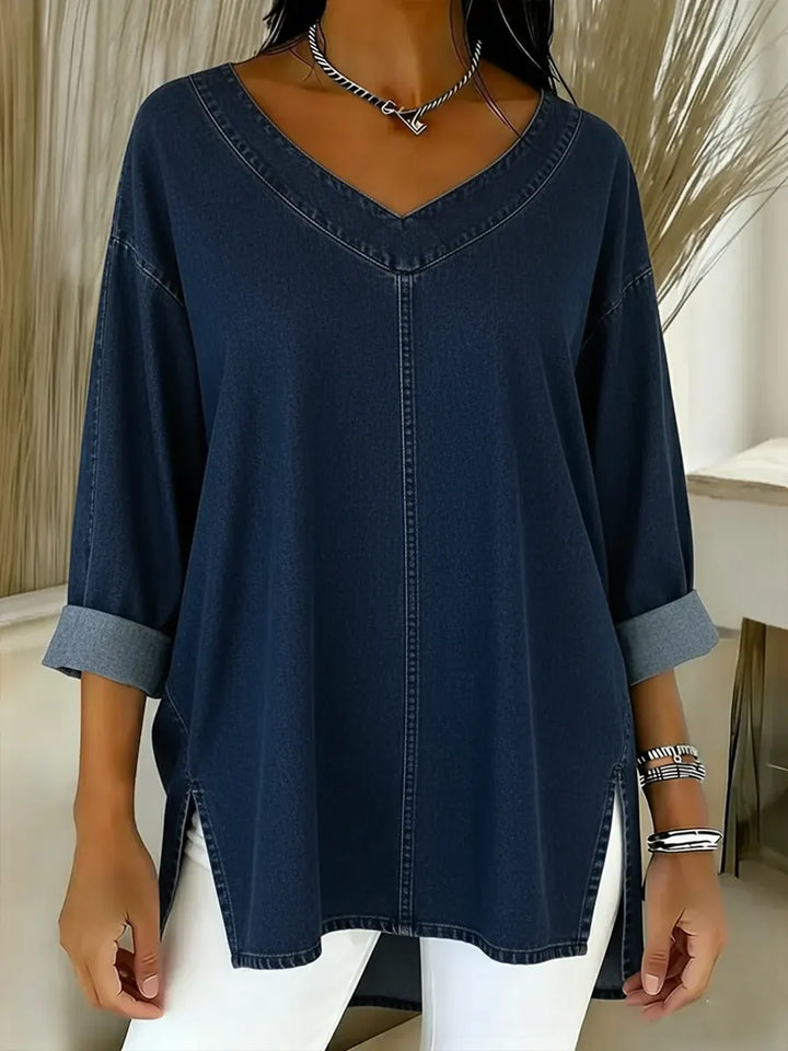 Chic women's V-neck tunic shirt with a relaxed long sleeve design, perfect for versatile layering and casual fashion.