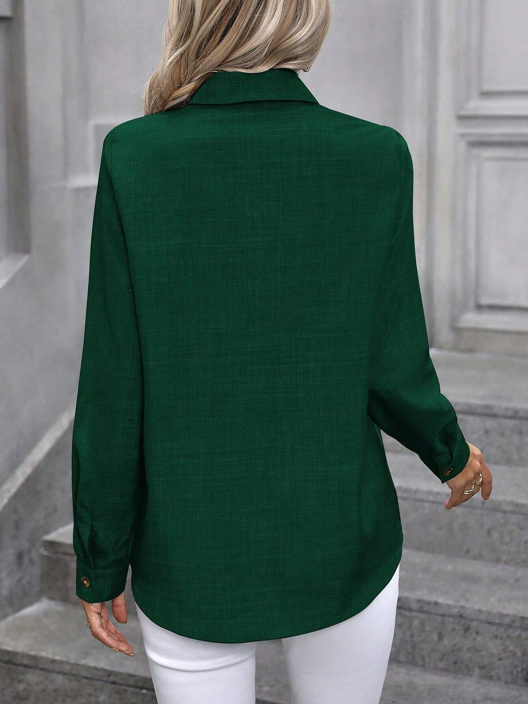Women's crisp cotton long sleeve button-up shirt, perfect for a refined everyday look.