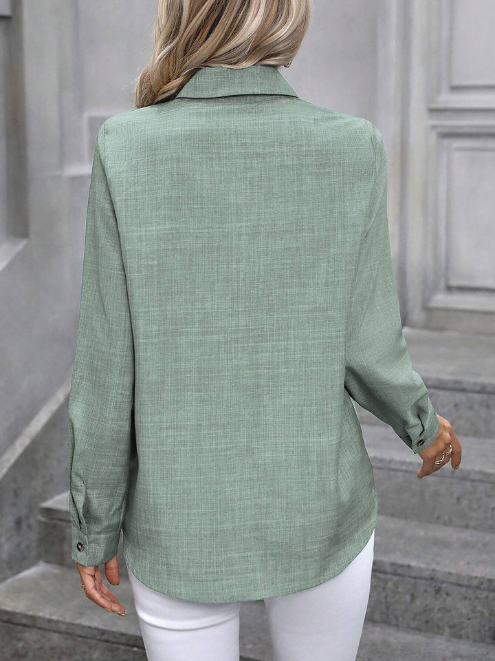 Versatile long sleeve top for women, a classic button-up design for everyday smart casual.