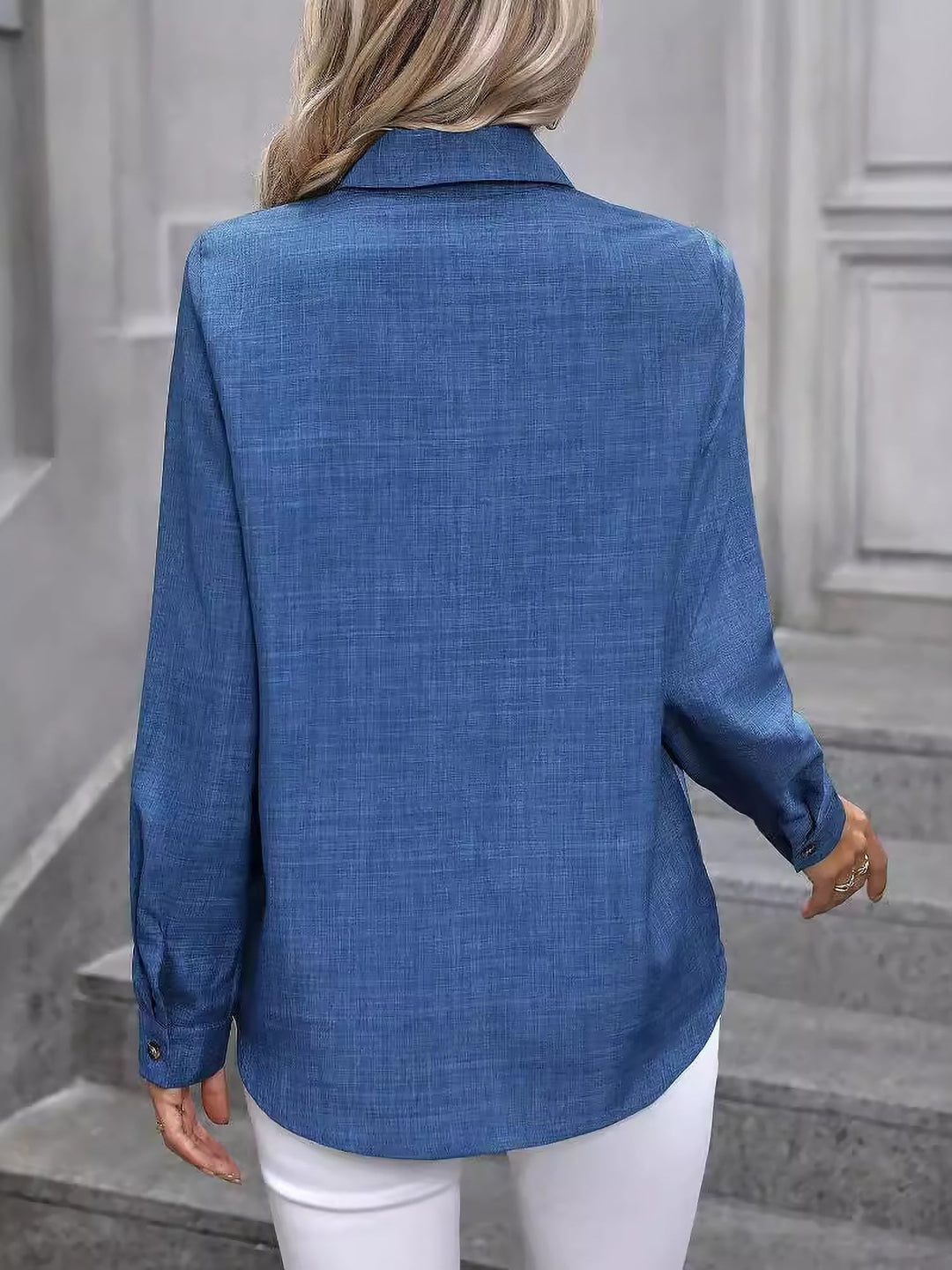 Women's professional long sleeve button-up shirt in cotton, a classic workwear item.