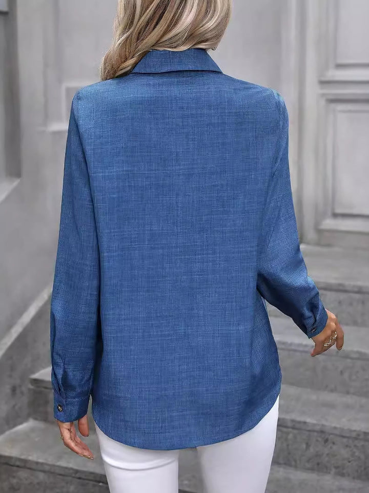 Women's professional long sleeve button-up shirt in cotton, a classic workwear item.