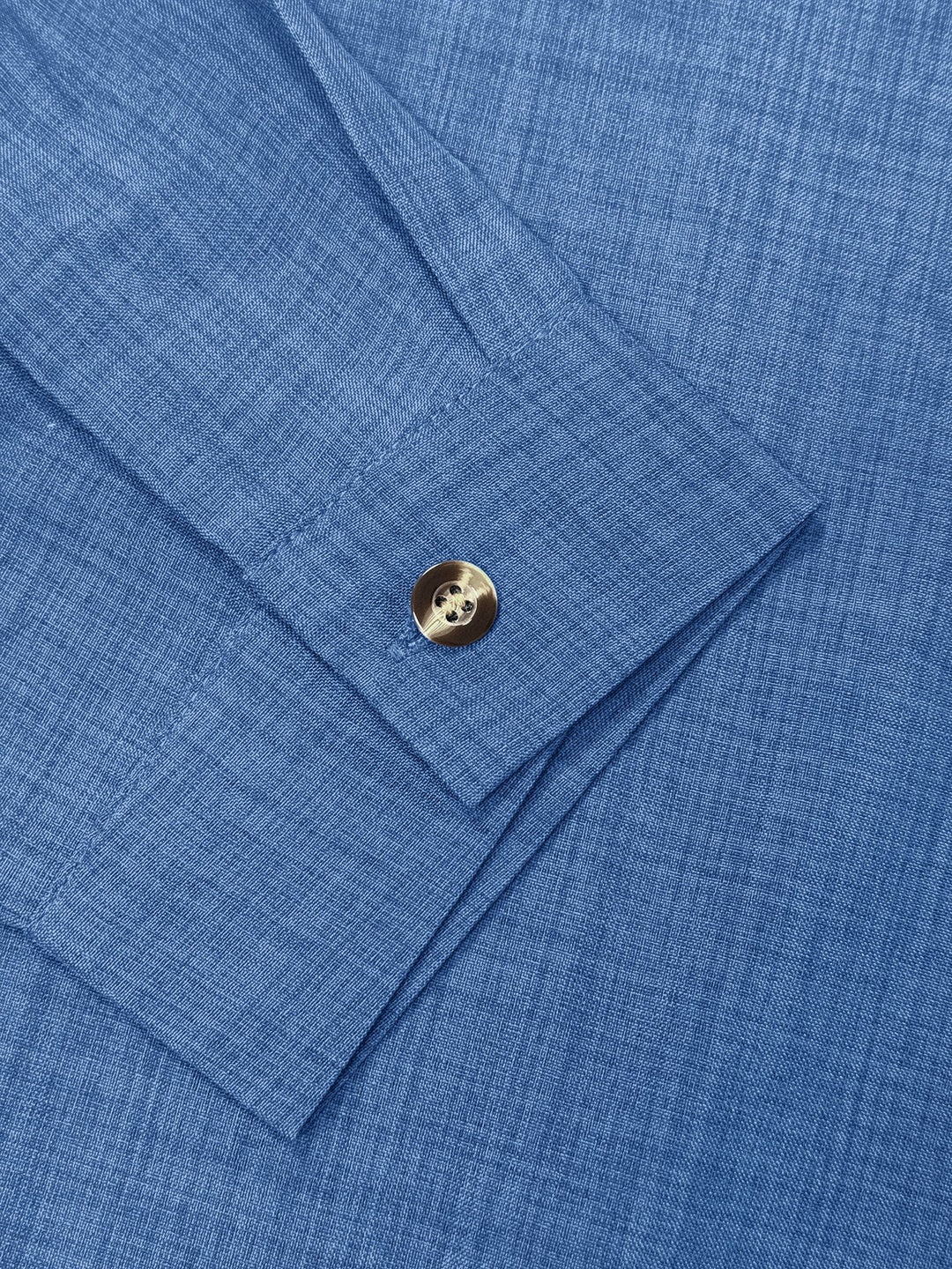 Crisp white women's long sleeve button-up shirt, a versatile and classic wardrobe essential.