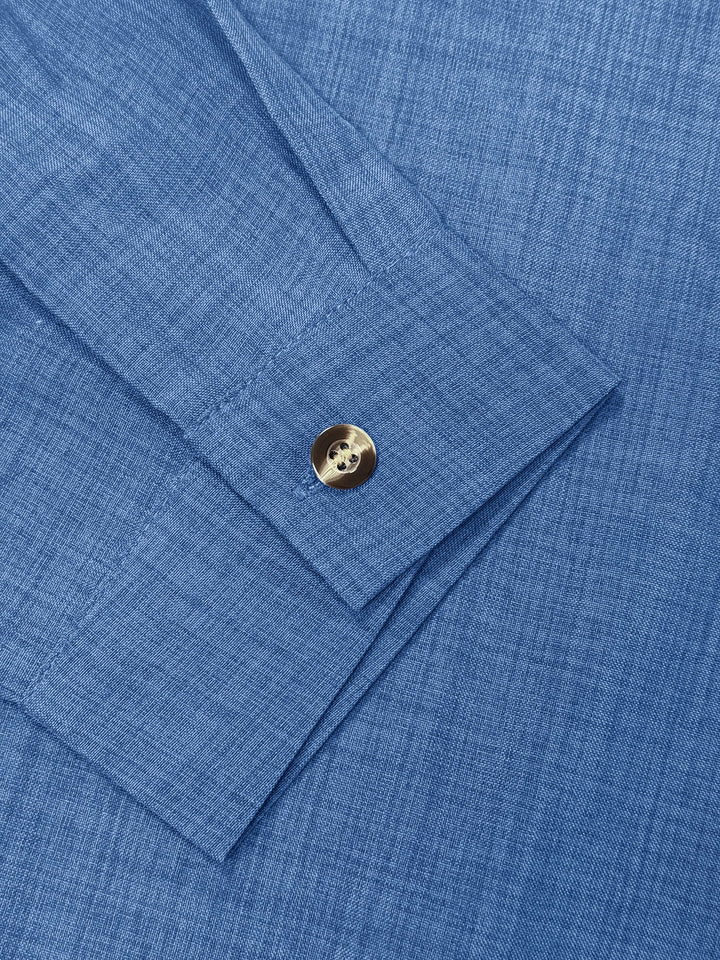 Crisp white women's long sleeve button-up shirt, a versatile and classic wardrobe essential.