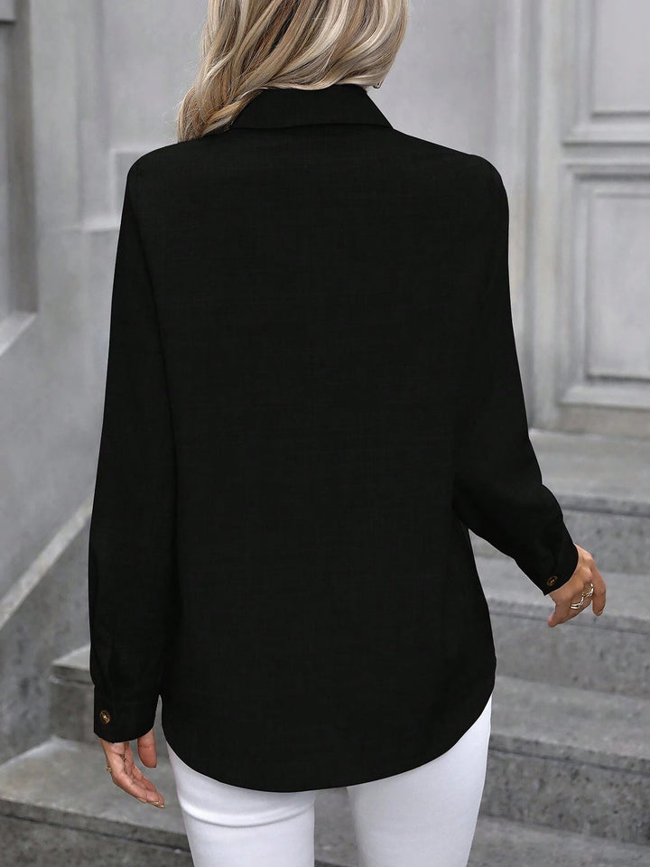 Smart casual women's top, a classic button-front shirt with long sleeves for versatile outfits.