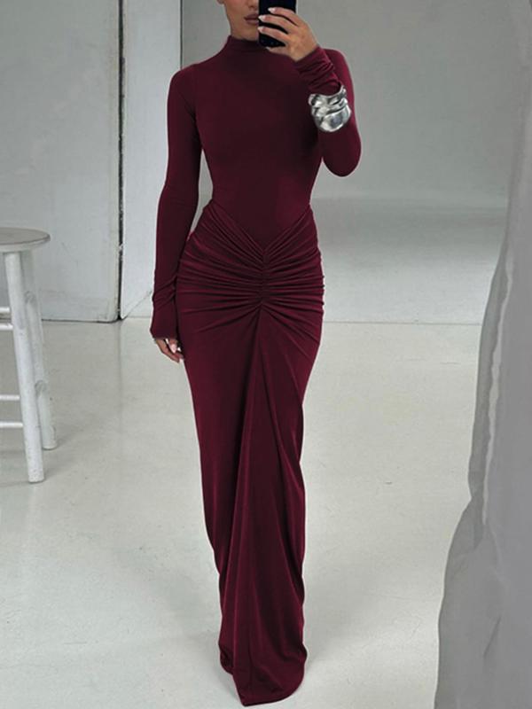 Sophisticated women's bodycon maxi dress with ruched long sleeves. Perfect evening dress for a chic, elegant look.