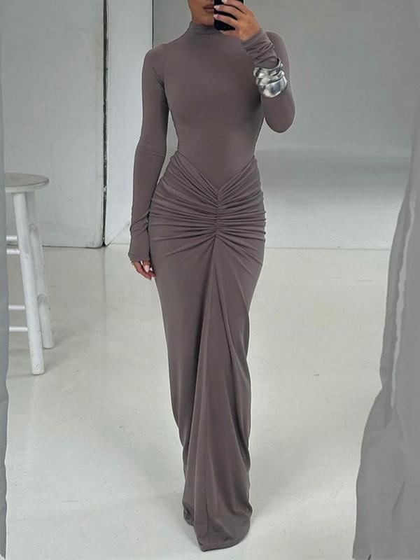 Classy women's long sleeve bodycon maxi dress featuring elegant ruching and a stylish mock neck. Formal evening wear.
