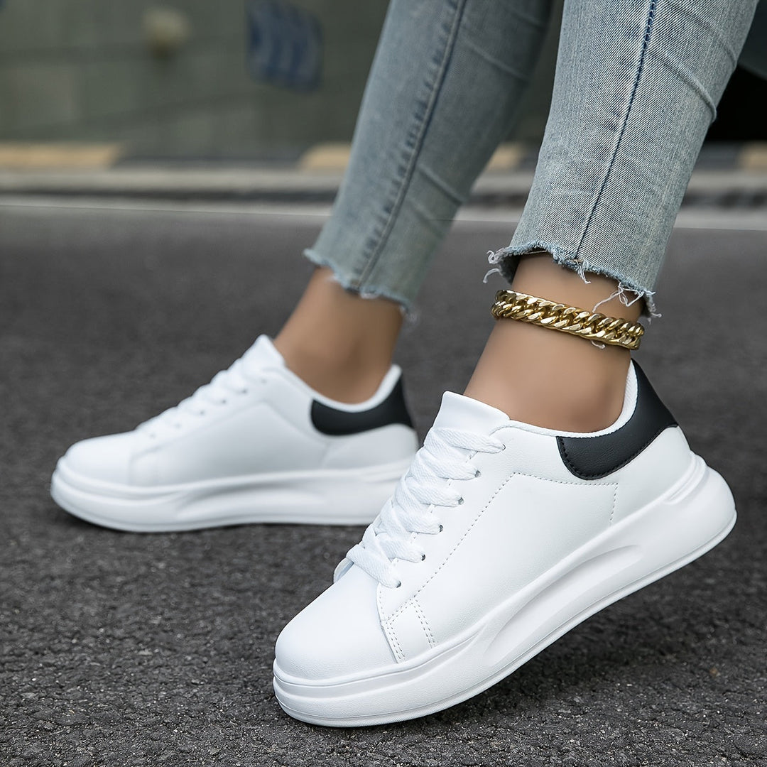 Crisp white fashion sneakers for women, providing effortless style and ultimate comfort for everyday use.