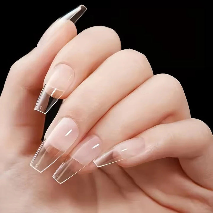High-quality clear soft gel false nail tips for women, offering a natural look for elegant manicures.