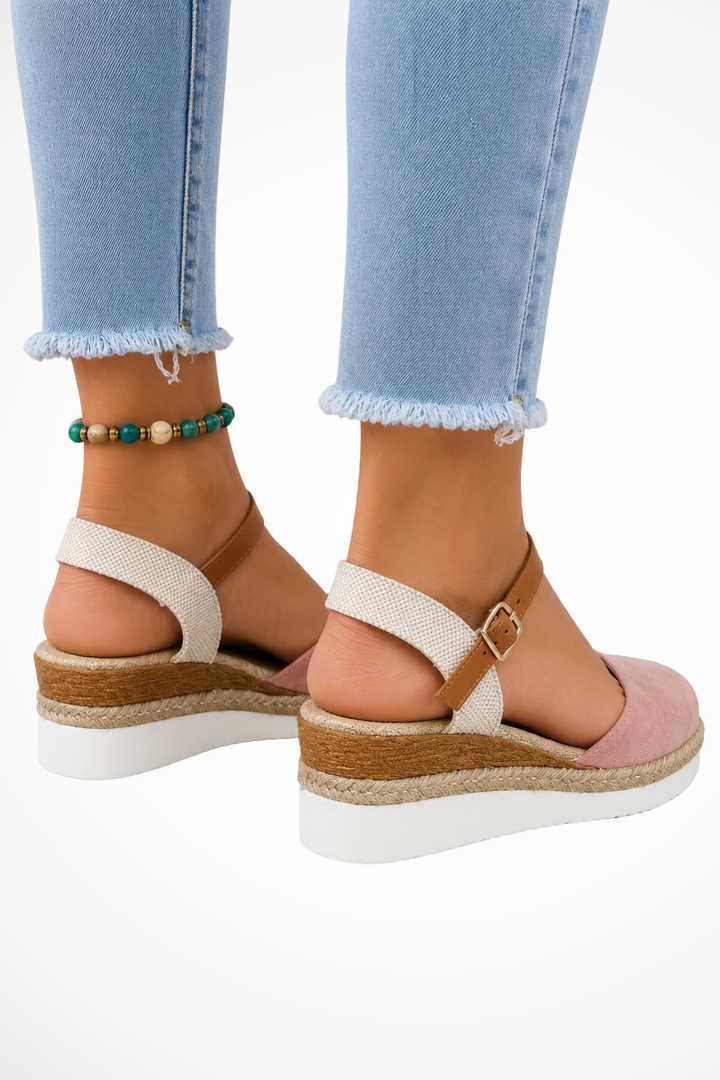 Women's sophisticated closed toe espadrille wedges, featuring a comfortable ankle strap for stylish wear.