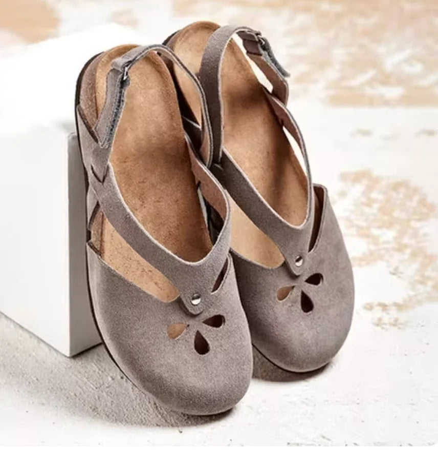 Delicate floral cut-out closed-toe slingback sandals for women. Comfortable & chic summer shoes, ideal for any occasion.