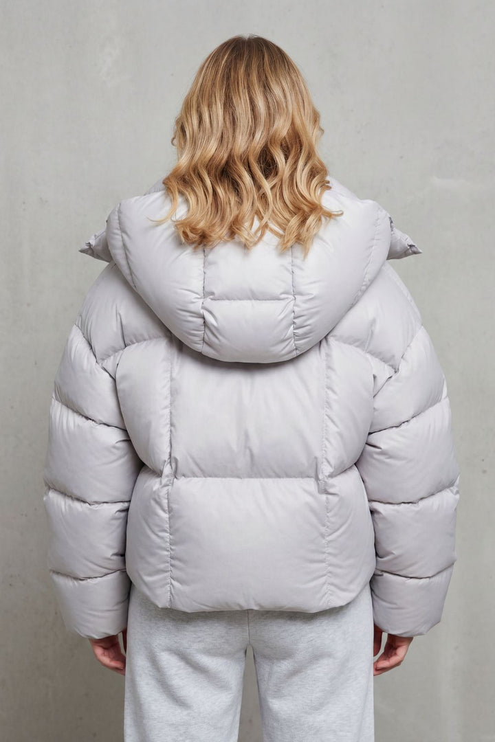 Stylish charcoal women's cropped puffer jacket, cloud soft and lightweight, perfect for winter fashion & casual wear.