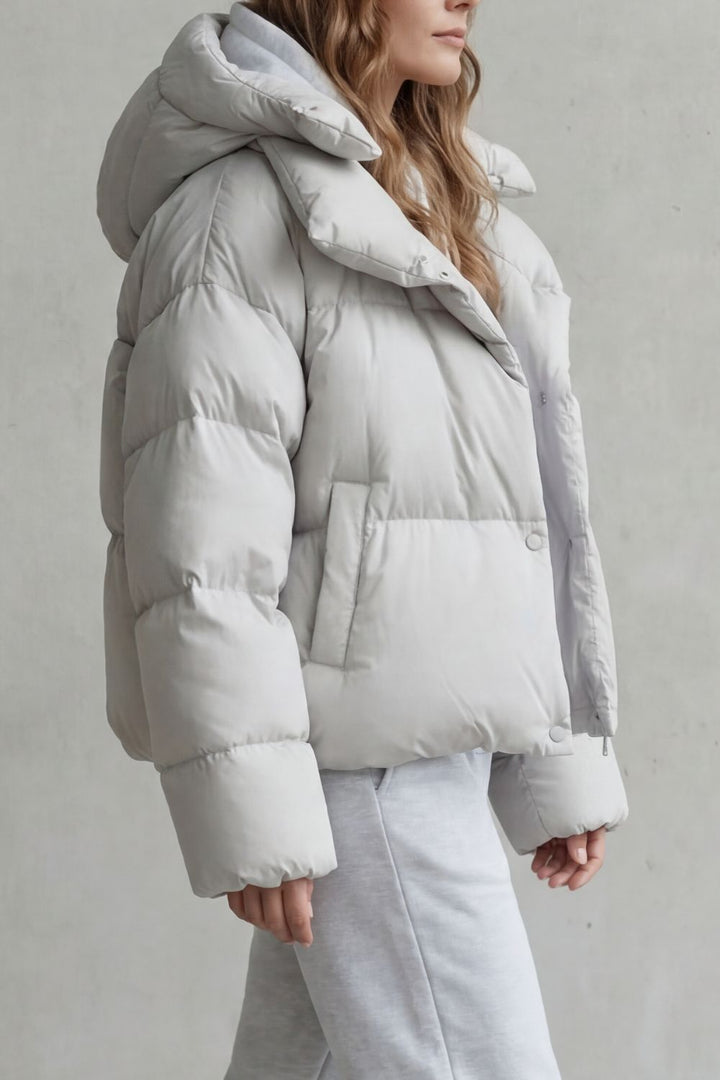 Lightweight women's cloud soft cropped puffer jacket, stylish outerwear for cozy winter fashion and everyday wear.