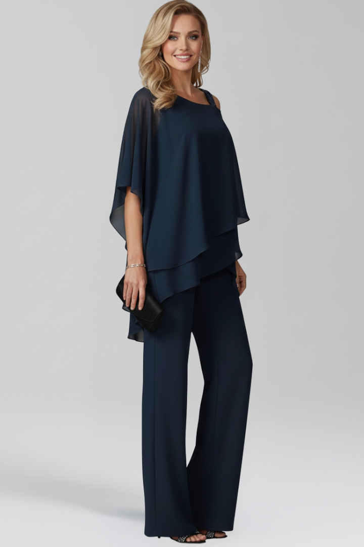 Comfortable flowing wide-leg jumpsuit for women, features stylish cold-shoulder design.