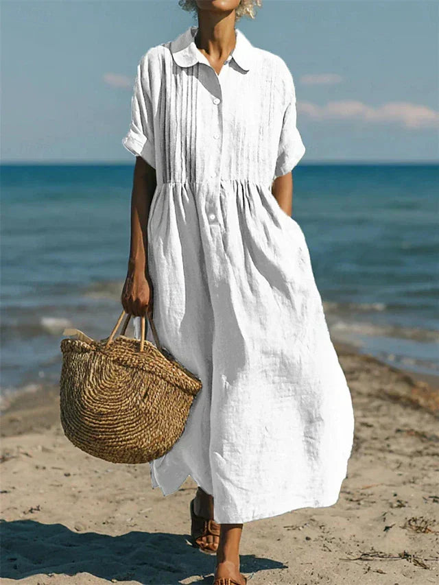 Women's collared buttoned pleated loose maxi dress, elegant and casual.