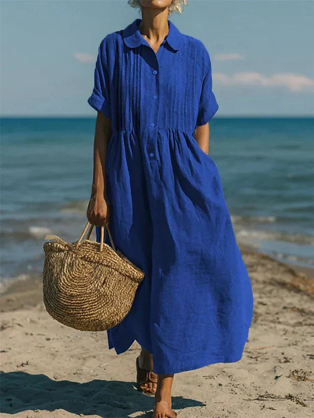 Loose collared buttoned pleated maxi dress for women, offering elegant comfort for casual wear.