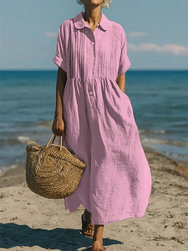 Stylish women's pleated maxi dress featuring a collared, buttoned front; perfect for casual elegance.