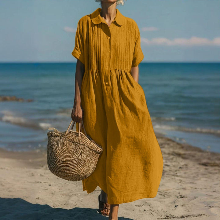 Elegant women's loose collared buttoned pleated maxi dress, ideal for summer and autumn fashion.