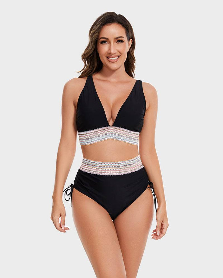 Flattering women's color block high-waisted bikini set with tummy control feature.
