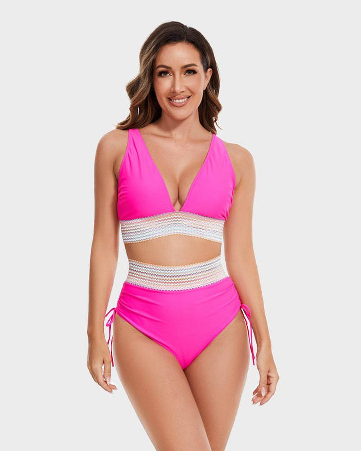 Vibrant women's color block high-waisted bikini set. Tummy control swimwear.