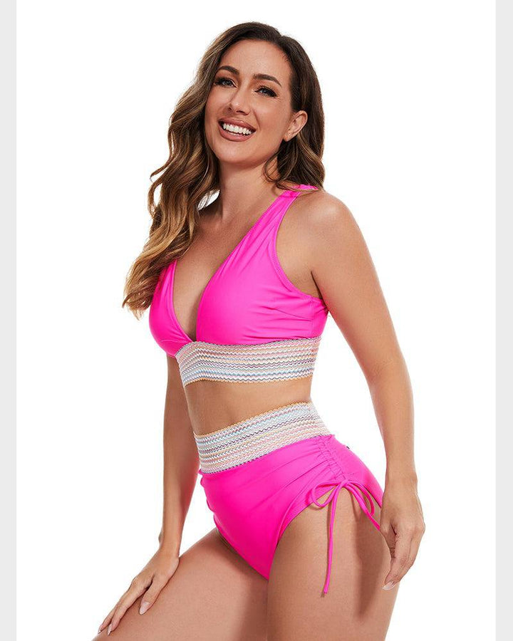 Chic women's high-waisted color block bikini set. Offers great tummy control.