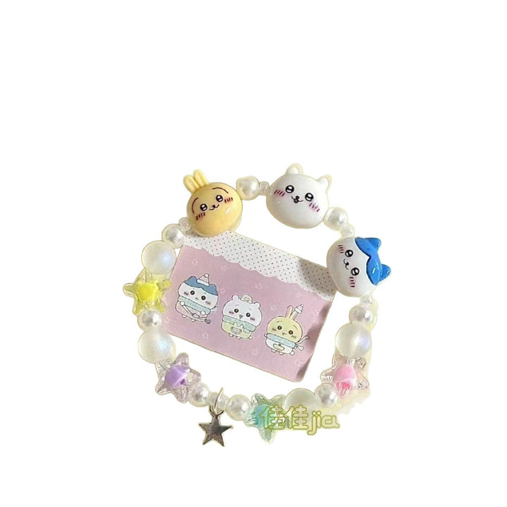 Fashionable women's bracelet featuring playful animal charms & colorful beads. Adds a fun, whimsical touch.