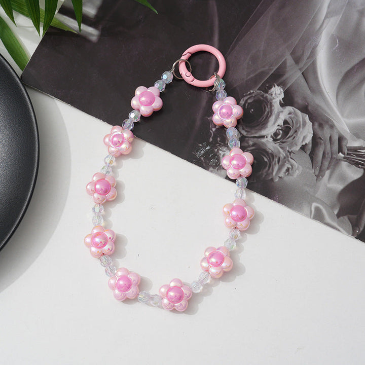 Women's elegant floral beaded phone chain, a colorful and practical smartphone lanyard accessory.