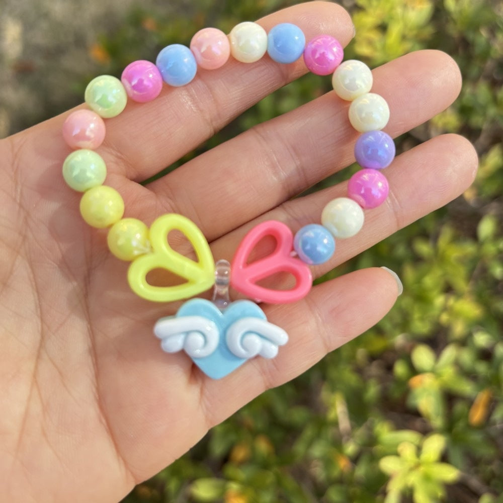Colorful floral charm bracelet, a playful and trendy women's fashion accessory.
