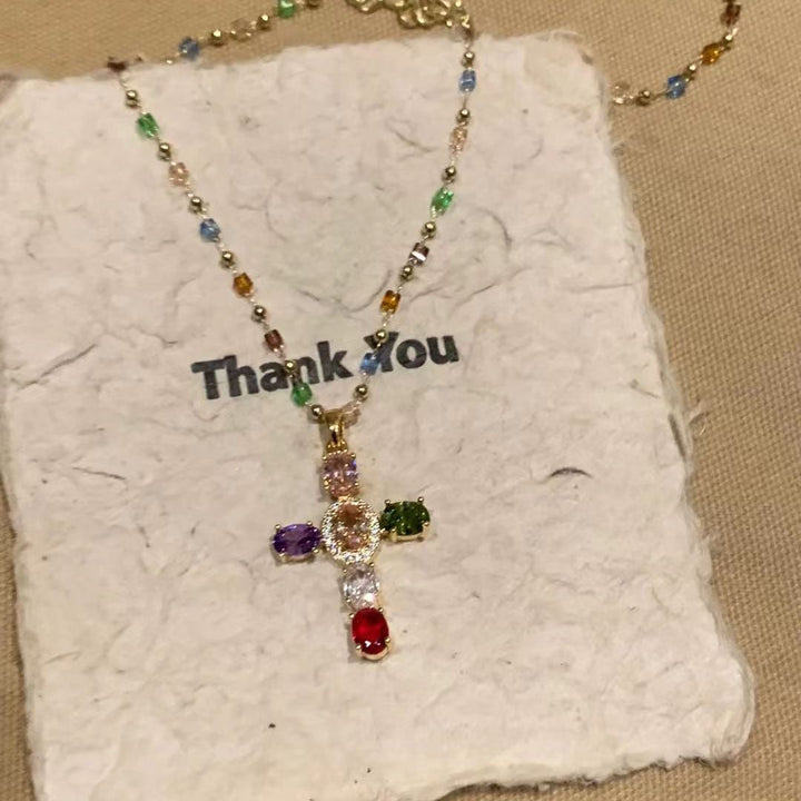 Women's colorful gemstone beaded cross necklace with a vibrant spiritual pendant, perfect fashion jewelry.