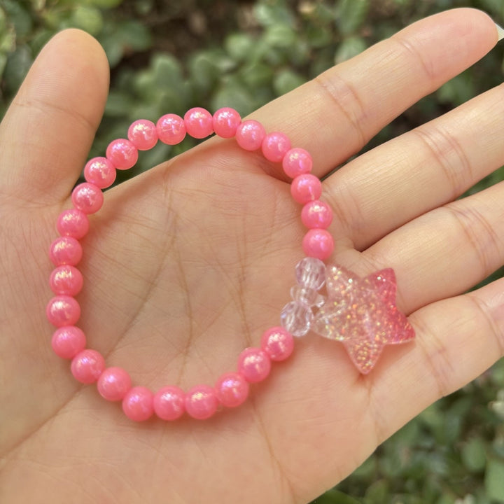 Delicate women's beaded bracelet with a cute glass elephant charm, perfect for everyday wear, elastic.