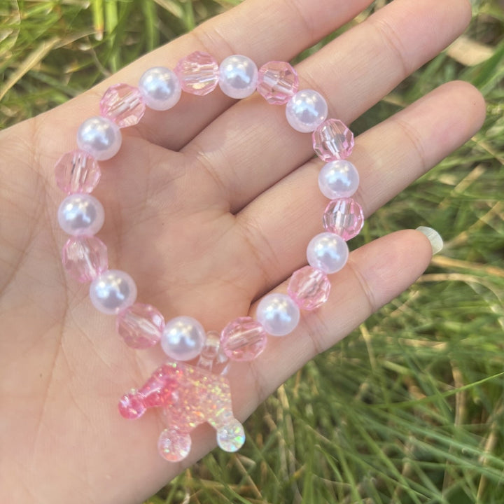 Perfect gift for her: Women's colorful glass elephant charm bracelet, delicate and trendy fashion accessory.