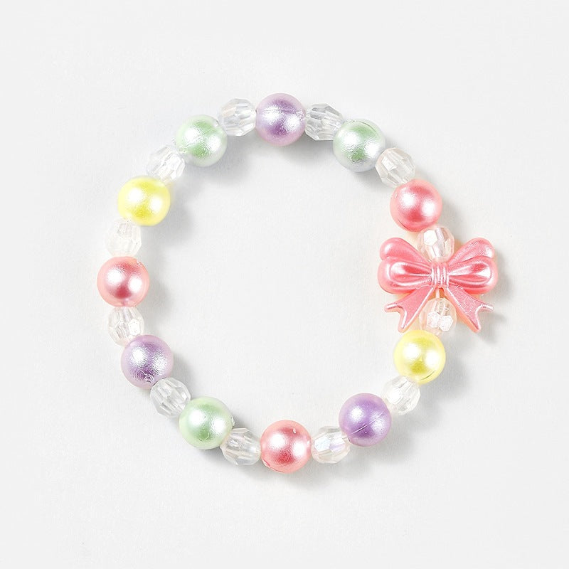 Durable woven friendship bracelet featuring bright, colorful heart charms. Adjustable wristband.