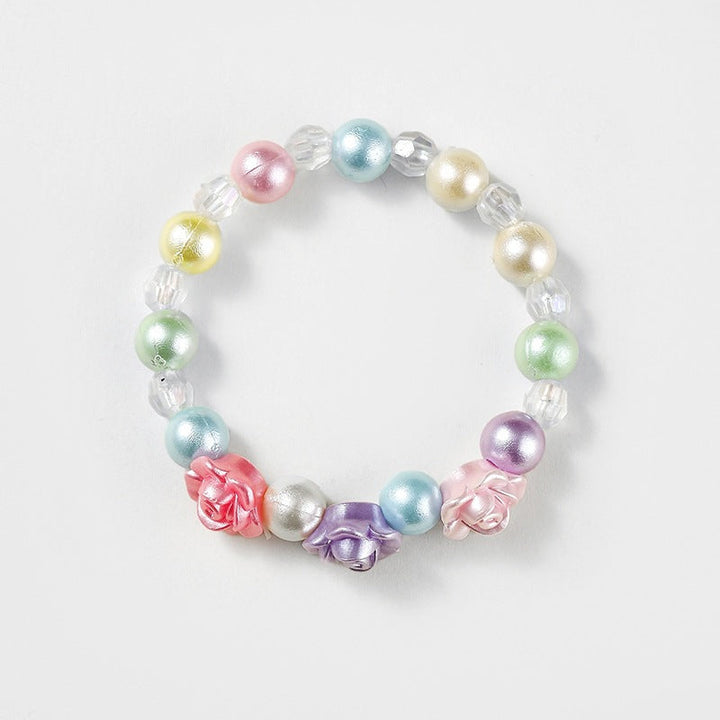 Detailed view of a colorful heart charm on an adjustable women's friendship bracelet.