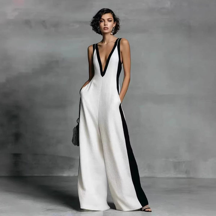 Women's colour-block wide leg jumpsuit with V-neck, sleeveless design. Elegant and modern one-piece for versatile wear.