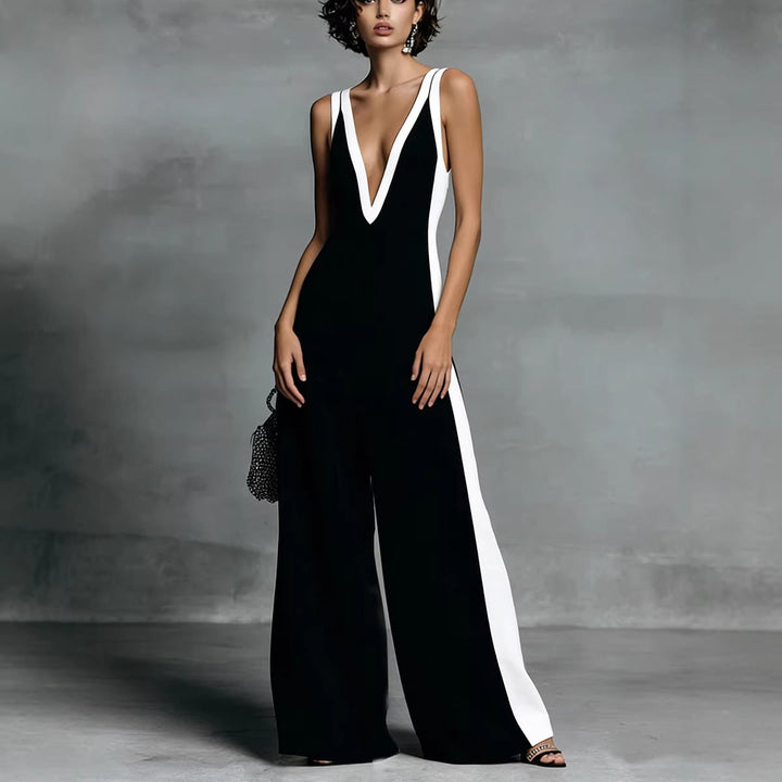 Comfortable sleeveless colour-block jumpsuit for women, featuring a flattering V-neck and relaxed wide leg. Modern fashion.