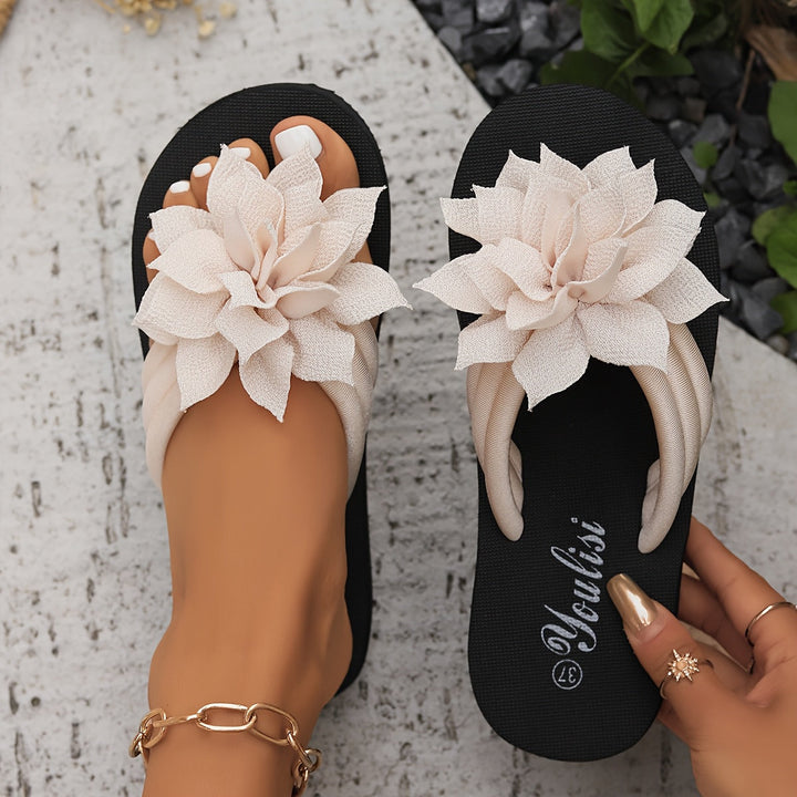 Women's vacation essential: floral platform flip flops with a wide fit for ultimate summer comfort.