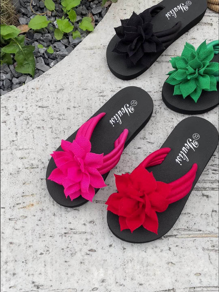 Comfortable women's floral platform flip flops, wide fit, perfect for beach, pool, or everyday wear.