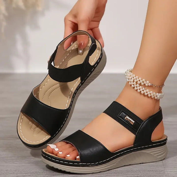 Stylish women's open-toe casual sandals with ergonomic design, perfect for summer walking.