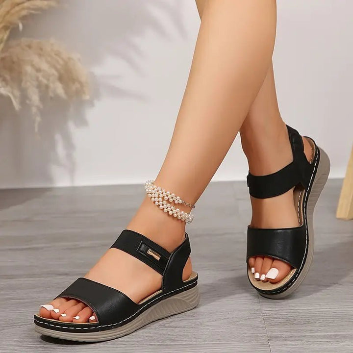 Summer style women's open-toe sandals for walking, featuring adjustable straps & cushioning.